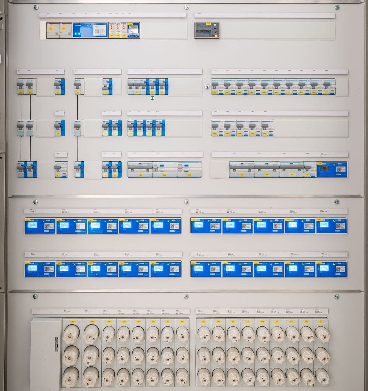 Industrial electrical switchgear cabinets in a commercial power distribution room